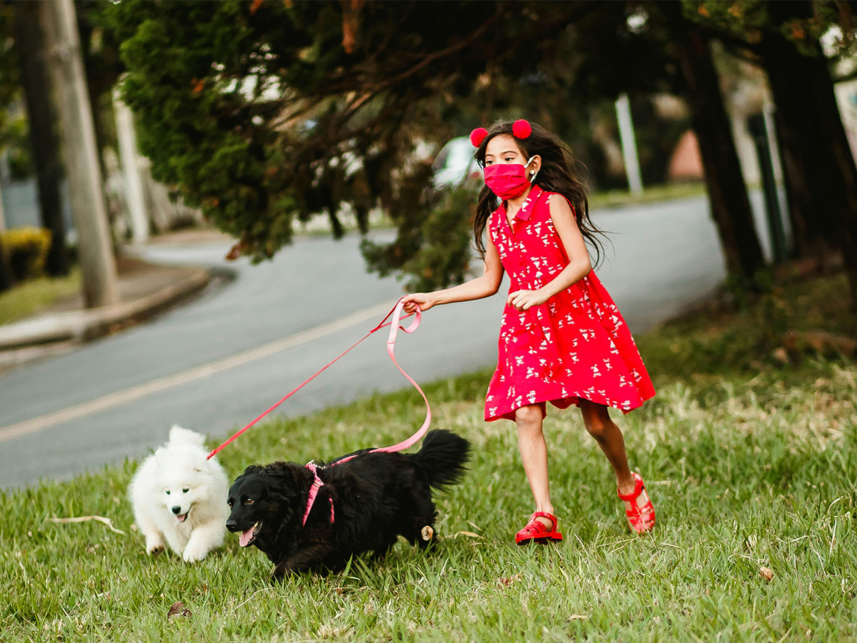 Girl enjoying with her pets